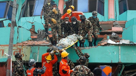In quake-hit Nepal, rescue workers struggle to recover the dead as toll climbs